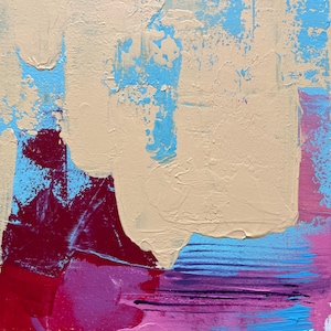 May include: Abstract painting with thick brushstrokes in beige, light blue, red, and pink. The textured artwork features layered paint, creating a dynamic and colorful composition. The piece has a modern, expressive style.