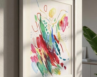 Puede incluir: Una pintura abstracta enmarcada que presenta pinceladas de acuarela vibrantes en tonos rojo, verde, azul y amarillo sobre un fondo blanco. La obra muestra una variedad de formas orgánicas, líneas finas y patrones de puntos en un marco blanco.