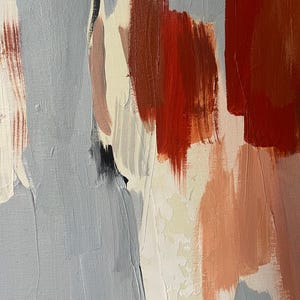 May include: An abstract painting on canvas featuring bold, vertical brushstrokes in shades of slate grey, deep terracotta red, soft cream, and muted peach. The textured paint application shows visible layering and varying opacity across the surface.