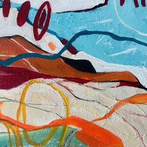 May include: Abstract acrylic painting with a textured surface. The artwork features a landscape-like composition with a palette of orange, red, blue, and white. Bold lines and shapes create a dynamic and colorful visual experience.