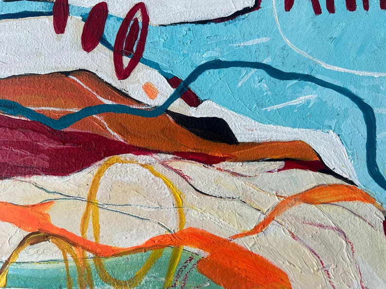 May include: Abstract acrylic painting with a textured surface. The artwork features a landscape-like composition with a palette of orange, red, blue, and white. Bold lines and shapes create a dynamic and colorful visual experience.