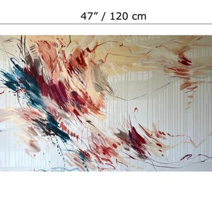May include: Abstract painting on canvas, measuring 47 inches wide and 31.5 inches high. The artwork features a blend of colors, including blue, red, and beige, with dynamic brushstrokes and a textured appearance. The painting's style is modern and expressive.