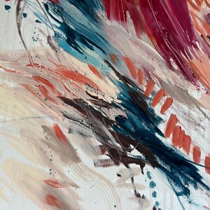 May include: Abstract painting with bold brushstrokes in shades of red, blue, and peach on a white canvas. The artwork features a dynamic composition with visible texture and a variety of colors, creating a sense of movement and depth.