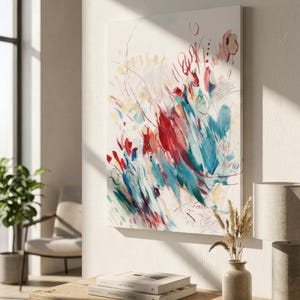 May include: A rectangular canvas painting featuring abstract brushstrokes in vibrant shades of red, teal, and yellow against a white background. The composition includes energetic lines, circular shapes, and layered paint textures.