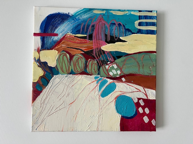 May include: Abstract landscape painting on canvas. The artwork features a textured white foreground with blue and red accents. The background includes a blue sky, yellow clouds, and green and orange hills. Pink and red tree-like shapes are also present.