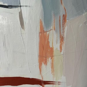 May include: An abstract painting on canvas featuring a textured composition of white, light blue, peach, and deep red paint. The artwork displays visible brushstrokes and layered colour blocks, with a prominent horizontal dark red line across the lower section.