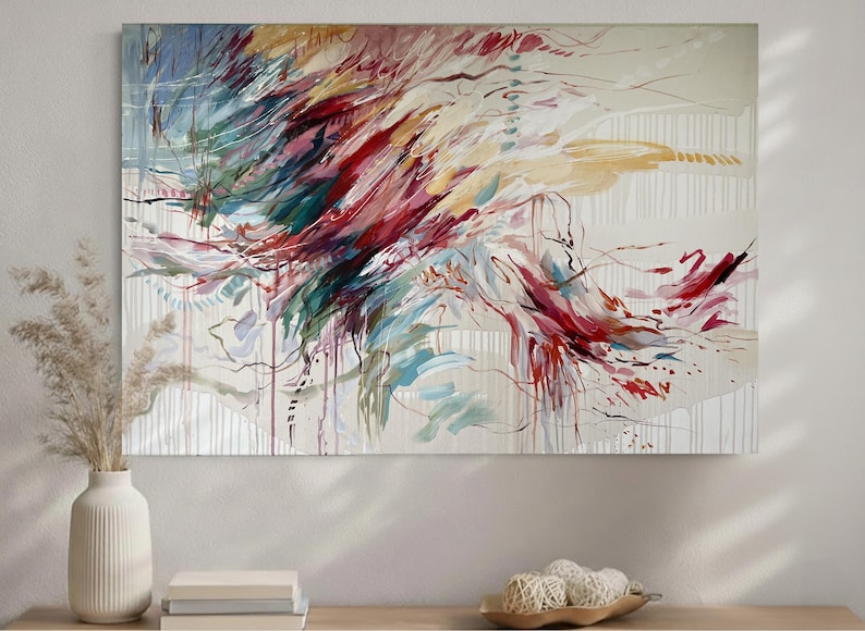 May include: Abstract painting with a dynamic composition. The artwork features a blend of colors, including red, teal, and yellow, creating a sense of movement. The background is a neutral off-white with vertical lines.