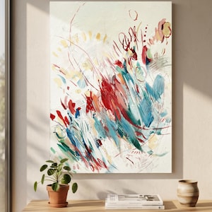 Op de afbeelding: Een verticaal rechthoekig canvas met een abstract schilderij op een crèmekleurige achtergrond. De compositie bevat energieke penseelstreken in levendig rood, diep blauwgroen, zachtgeel en gedempt roze, wat zorgt voor een dynamische visuele textuur.