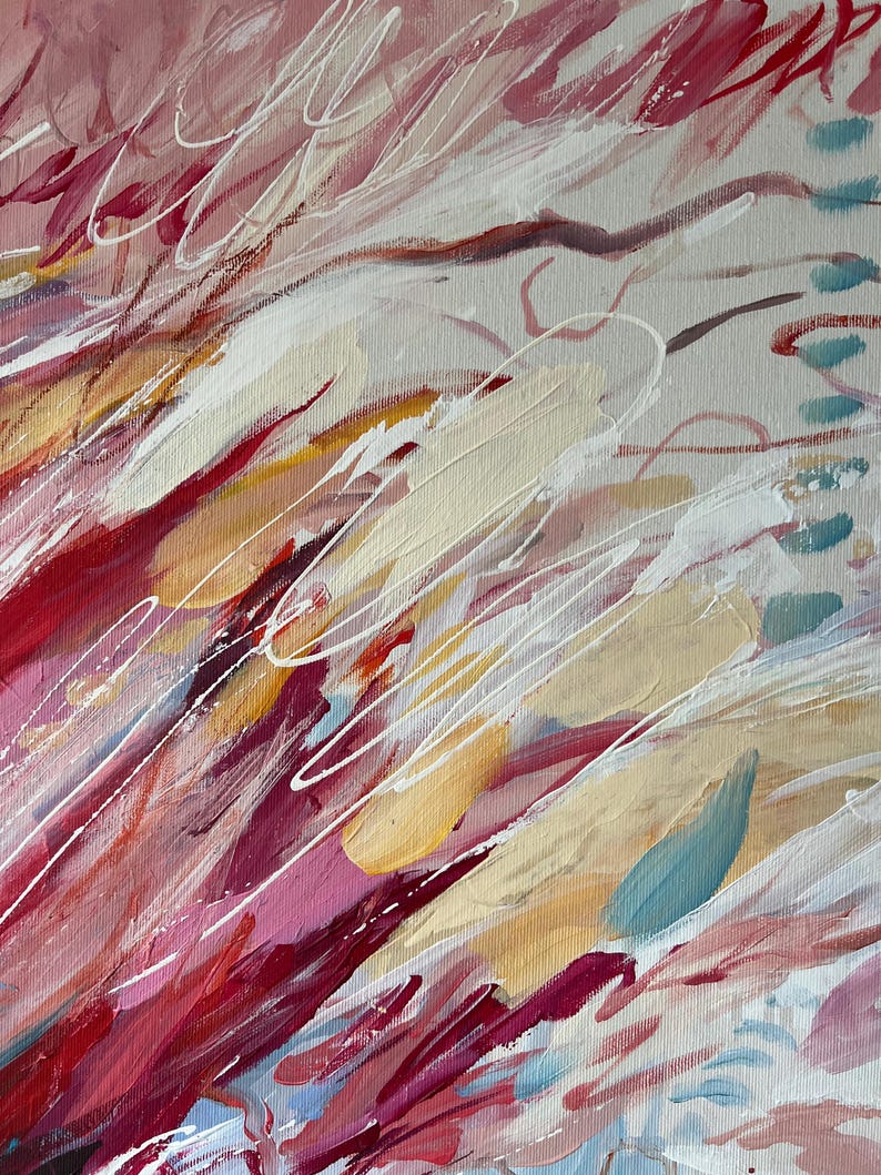 May include: Abstract painting with a palette of pink, red, yellow, and blue hues. The artwork features dynamic brushstrokes and white linear accents, creating a sense of movement and texture. The composition is a close-up view of the painted canvas.