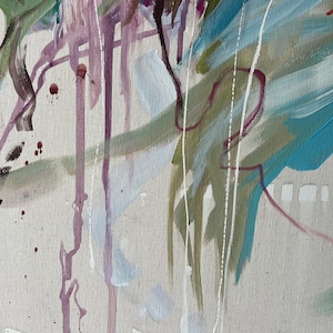 May include: Abstract painting with brushstrokes in shades of blue, green, purple, and white on a beige canvas. The artwork features a mix of thick and thin paint applications, creating a textured effect. Splatters and drips add to the dynamic composition.
