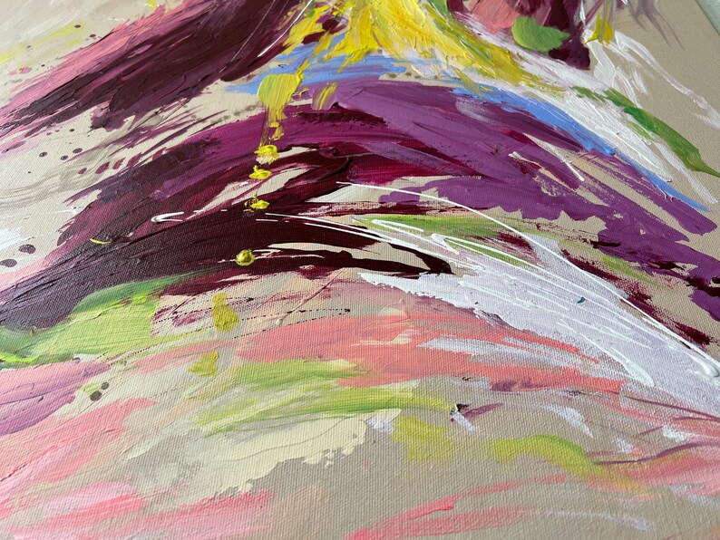 May include: Abstract painting with bold brushstrokes in shades of burgundy, purple, pink, yellow, and green. White and gold accents add contrast. The artwork is on a beige canvas, creating a textured effect.