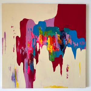May include: Abstract painting on canvas with a cream background and bold strokes of red, purple, blue, yellow, and pink. The artwork features a mix of textures and colors, creating a dynamic visual effect.