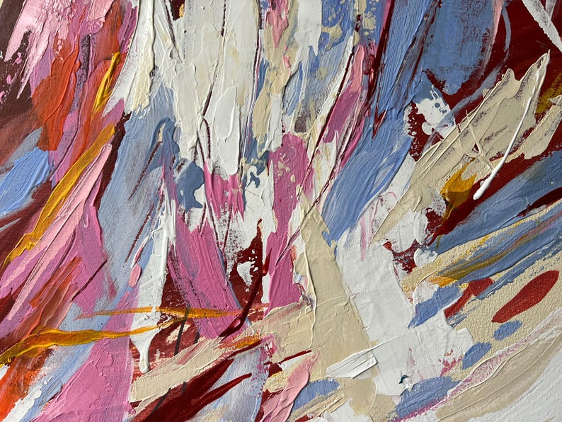 May include: Abstract painting with thick brushstrokes in shades of pink, white, blue, and red. The artwork features textured layers and visible brush marks, creating a dynamic and expressive composition. Yellow and beige accents add contrast.