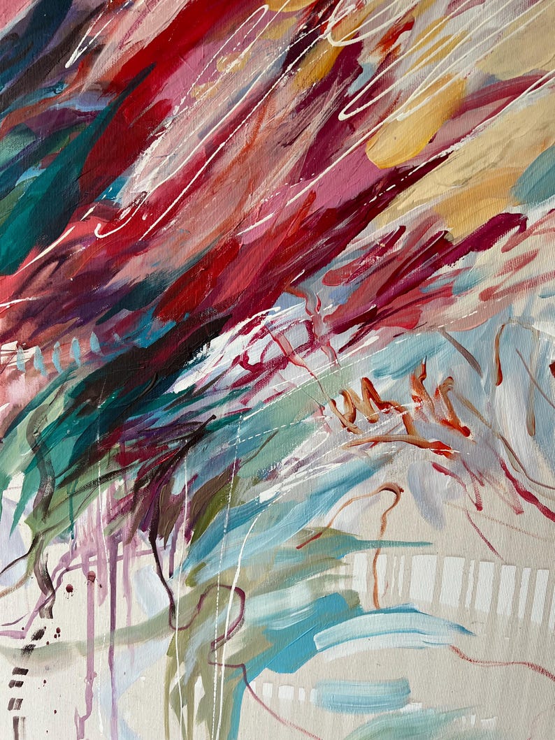 May include: Abstract painting with a beige background and bold brushstrokes in red, pink, teal, and yellow. White lines and drips add texture. The artwork has a dynamic, energetic feel.