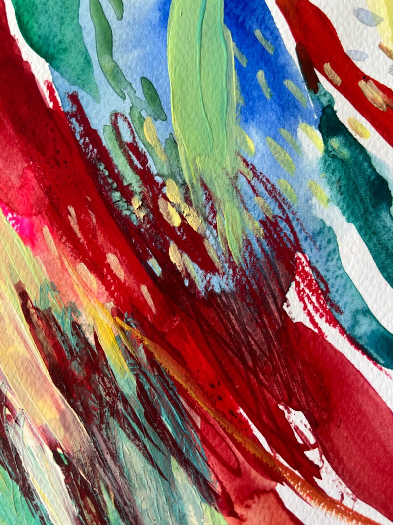 May include: An abstract painting on textured paper featuring bold, sweeping brushstrokes in vibrant red, deep teal, bright blue, and lime green. Small, scattered gold paint marks add texture and contrast against the layered, colorful composition.