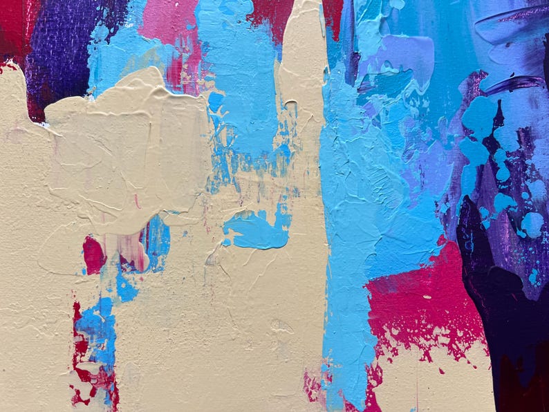 May include: Abstract painting with thick brushstrokes in shades of beige, light blue, pink, and deep purple. The textured surface creates a dynamic and expressive artwork. The artwork is a close-up view of the painted canvas.