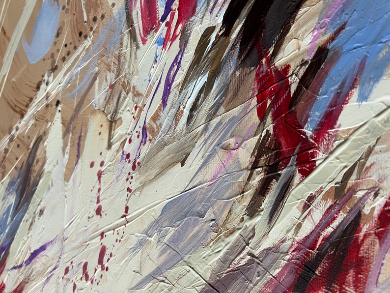 May include: Abstract painting with thick brushstrokes in shades of beige, white, red, blue, and purple. The artwork features textured layers and splatters, creating a dynamic and expressive composition. The painting's style is modern and contemporary.