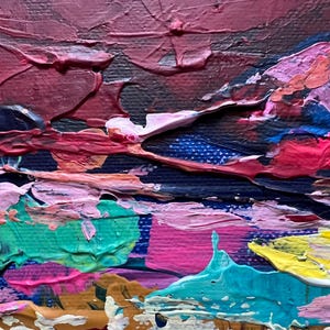 May include: Close-up of an abstract painting with thick brushstrokes. The artwork features a palette of colors including deep reds, blues, pinks, greens, and yellows. The texture is heavily layered, creating a three-dimensional effect.