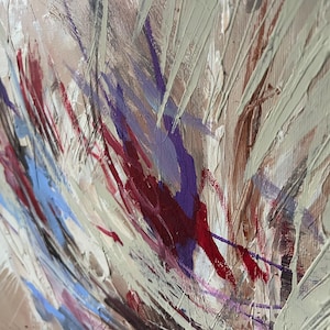 May include: Abstract painting with a textured surface. The artwork features a palette of beige, red, purple, and blue hues, applied with visible brushstrokes. The composition has a dynamic, energetic feel, with a focus on color and texture.
