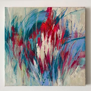 May include: Abstract painting with a textured surface. The artwork features bold brushstrokes in shades of red, teal, and blue, with hints of white and cream. The composition evokes a sense of movement and energy, with a focus on color and texture.