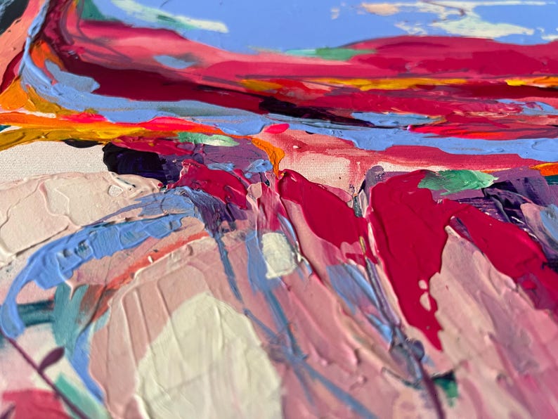 May include: Abstract painting with thick brushstrokes in shades of pink, red, blue, and yellow. The artwork features a textured surface, with visible paint layers creating a dynamic and colorful composition. The style is expressive and modern.