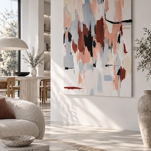 May include: A large rectangular canvas painting featuring abstract vertical brushstrokes in shades of terracotta, dusty blue, black, and cream. The artwork displays a layered composition with varying textures and bold colour blocks on a white background.