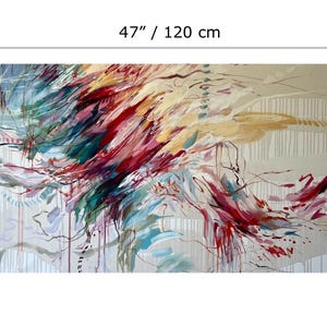 May include: Abstract painting on canvas, measuring 47 inches wide and 31.5 inches high. The artwork features dynamic brushstrokes in shades of red, teal, gold, and purple against a neutral background. The painting has a modern, expressive style.