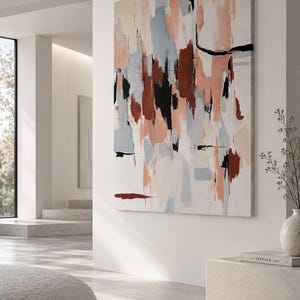 May include: A large rectangular canvas painting featuring an abstract composition of vertical brushstrokes in shades of terracotta, soft peach, light blue, cream, and black. The artwork displays textured paint application with bold, dark lines.