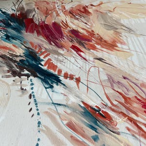May include: Abstract painting with dynamic brushstrokes in shades of red, teal, and peach against a white background. The artwork features a mix of thick and thin paint applications, creating a textured and layered effect. The composition has a sense of movement and energy.