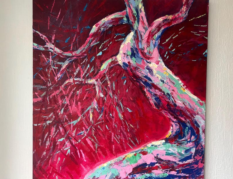 May include: Abstract painting of a tree with a vibrant color palette. The artwork features a deep red background with a tree trunk and branches in shades of pink, blue, and green. The painting is on a canvas.