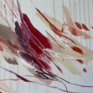 May include: Abstract painting with a cream-colored background and vertical stripes. The artwork features dynamic brushstrokes in shades of red, burgundy, brown, and cream, creating a sense of movement and depth. White accents add contrast.