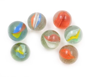 Lot of 7 Vintage Cat's Eye Shooter Marbles
