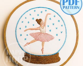 Ballerina danzante, globo di neve: accogliente scena invernale. Schema di ricamo a mano in PDF