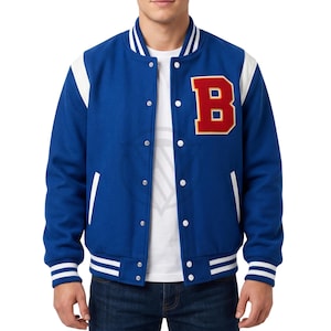 May include: A blue varsity jacket featuring white sleeves, a white striped collar, and white striped cuffs. The jacket has a large red letter B with a yellow border on the left chest, a white button-down front closure, and two side pockets.
