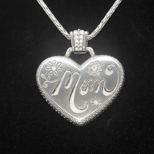 “A sparkling heart for Mom — a sweet reminder of love that shines every day.”