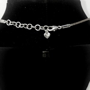 “Brighton’s signature heart charm and mixed‑chain design — a classic piece with timeless shine.”