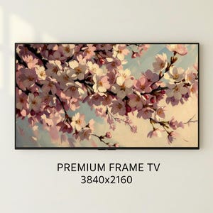 Puede incluir: Un letrero de madera hecho a mano con el texto "Welcome to our home" en un estilo manuscrito. El letrero está pintado de blanco con un acabado envejecido y presenta un borde negro. Un pequeño corazón decorativo está adjunto en la parte inferior.