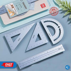 Könnte beinhalten: Ein Satz silberfarbener Zeichenwerkzeuge, darunter zwei Dreiecke, ein Winkelmesser und ein Lineal. Die Werkzeuge sind mit metrischen Maßen und dem Markennamen "deli" gekennzeichnet. Das Bild enthält auch eine Verpackung mit dem Text "No.79532".