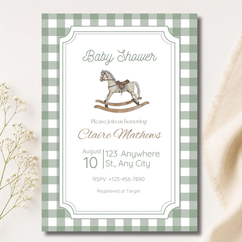 May include: Baby shower invitation with a green and white gingham pattern border. The invitation features a watercolour illustration of a rocking horse and includes the text "Baby Shower" and details for Claire Mathews.