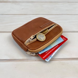 Cartera de cuero hecha a mano en piel suave con 3 cremalleras