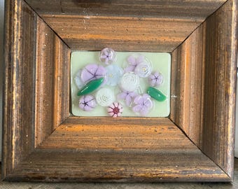 Fixierte Blume in einem Vintagerahmen