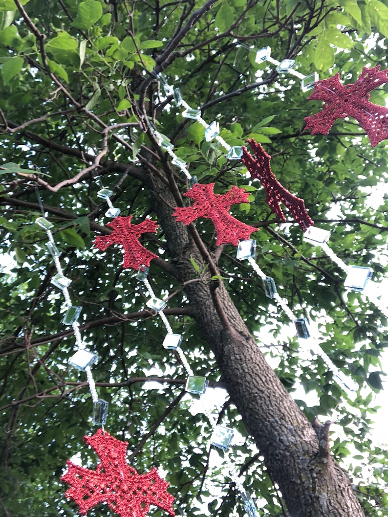 Garden Art Whimsical Sun Catchers with Red Cross and clear rhinestones.