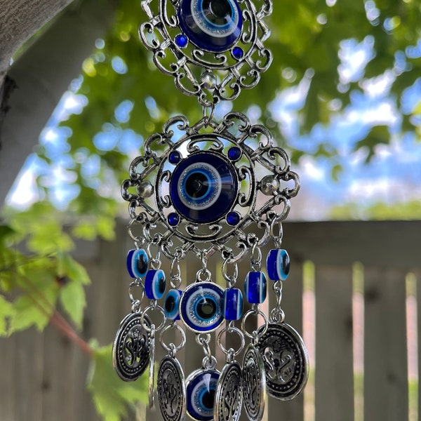 Evil Eye Amulet: Ward off negativity and bring good vibes with this hanging garden ornament!  Perfect zen boho decor, protect your space