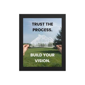 May include: Framed print with the text "TRUST THE PROCESS." and "BUILD YOUR VISION." A white house blueprint is superimposed over a green field and blue sky. The black frame surrounds the image.