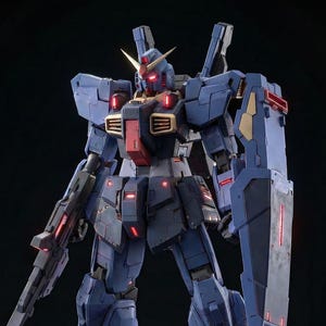 May include: A detailed, blue and gray mecha model with red accent lights. The model has a large shield, a rifle, and gold-colored details on the head. The robot is standing against a black background.