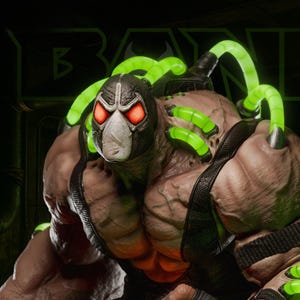 May include: A detailed 1:6 scale figure of Bane, a DC Comics villain. The figure features a mask, tubes, and muscular physique. The figure is predominantly brown, black, and green, with glowing red eyes and accents. The text "AVAILABLE ON PATREON" is visible.