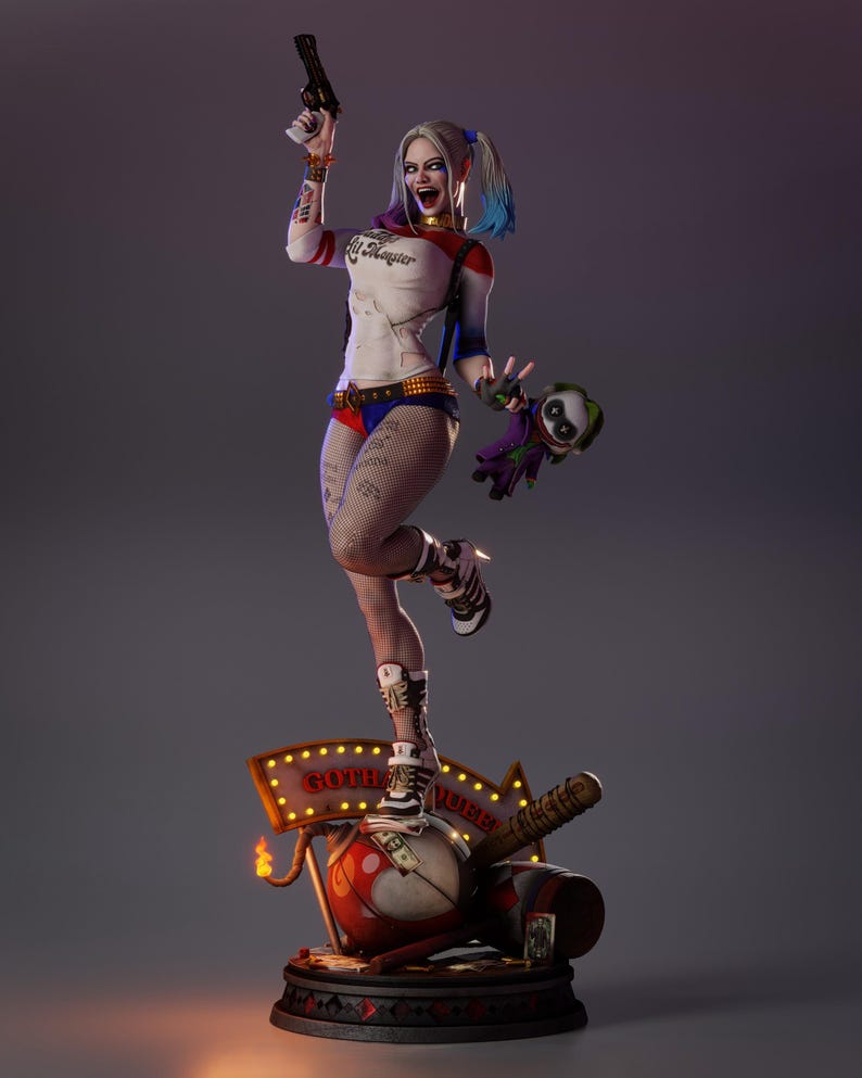 May include: A detailed figurine of a character with a white top, red and blue shorts, and fishnet stockings, holding a gun and a doll. The figure is standing on a base with a sign that reads "Gotham". The figure has a dynamic pose.