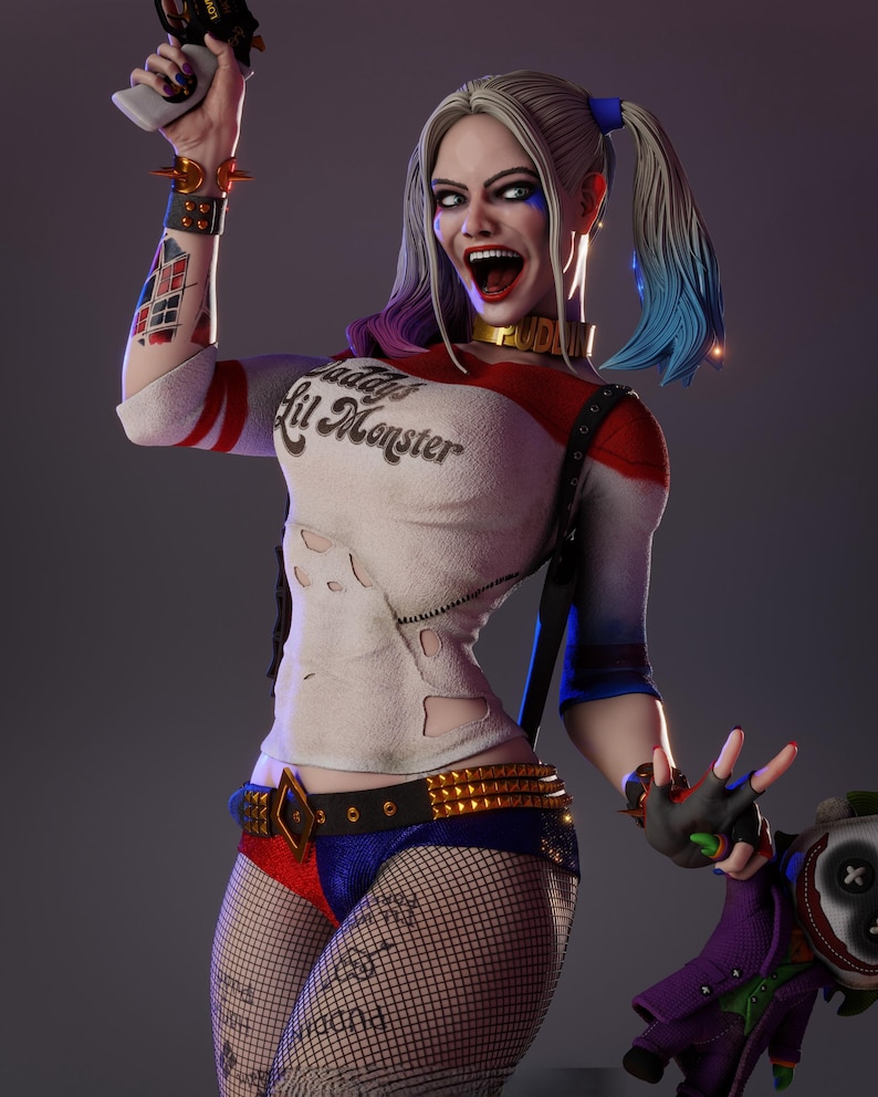 May include: A detailed figurine of a character with white and blue hair in pigtails, wearing a white, red, and blue outfit. The shirt has the text "Daddy's Lil Monster". The figure is holding a gun and a doll.