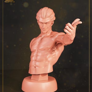 May include: A peach-colored bust of a muscular male figure with a confident expression and outstretched arm. The sculpture is mounted on a circular base. The top left corner features the text "HIGH-QUALITY" and "PRESUPPORTED".