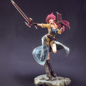 May include: A detailed figurine of a female character in a dynamic pose, holding a sword and a gun. She wears a yellow jacket, blue top, and a long, flowing skirt. Her pink hair is styled, and she stands on a rocky base. The figure is intricately designed.